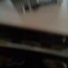 A blurry picture of the back of a table.