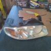 A car headlight sitting on top of a table.