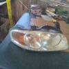 A car headlight sitting on top of a table.