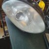 A close up of the headlight on a car