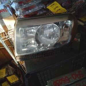 A car headlight sitting on top of a table.