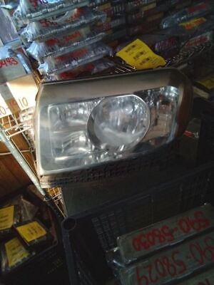 A car headlight sitting on top of a table.