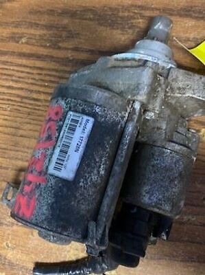 A motor that is on the ground and has been damaged.