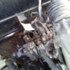 A car engine with some rust on it