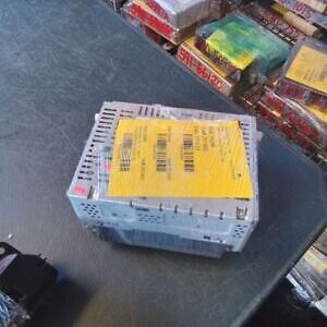 A box of electronic equipment sitting on top of a table.