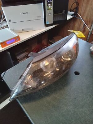 A car headlight sitting on top of a table.