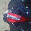 A red motorcycle is parked on the ground