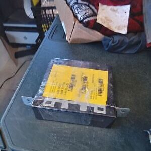 A box with some yellow stickers on it