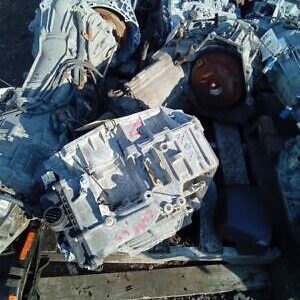 A pile of metal and other debris on top of a wooden platform.