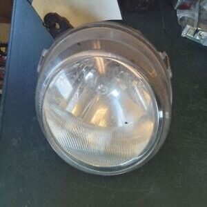 A clear glass bowl sitting on top of a table.