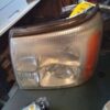 A close up of the front light on a car