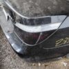 A black car with some writing on it