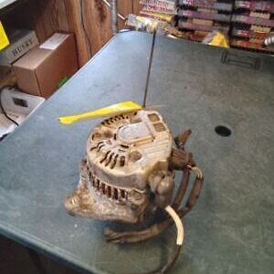 A car alternator sitting on top of a table.