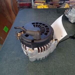 A car alternator sitting on top of a table.