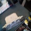 A blurry picture of a box and some drinks