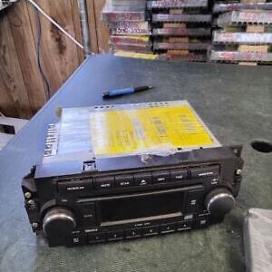 A car stereo is sitting on top of a table.