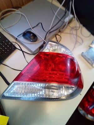 A car tail light sitting on top of a desk.