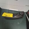 A remote control is sitting on the floor.