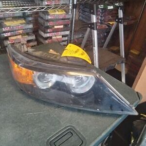 A car headlight sitting on top of a table.