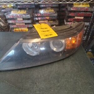 A car headlight sitting on top of a table.