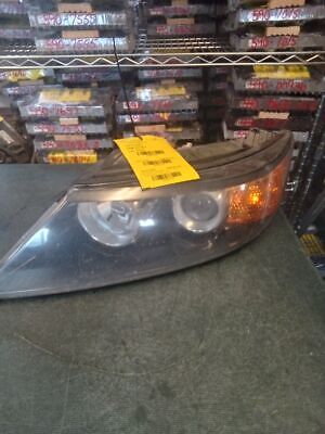 A car headlight sitting on top of a table.