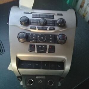 A car stereo with buttons and knobs on it