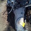 A motorcycle that is sitting in the dirt.