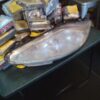 A table with some food and a lamp on it