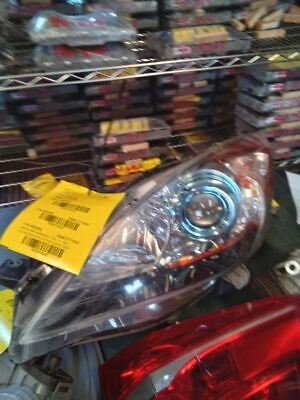 A car headlight with stickers on it