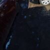 A car parked on the side of a road.