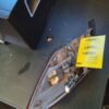 A boat with a yellow tag on it