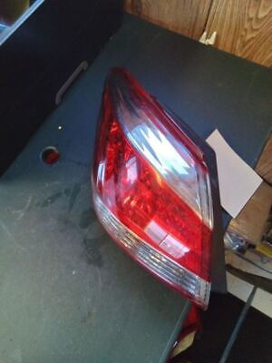 A car 's tail light is shown on the floor.