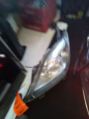 A car that has been smashed in the head.