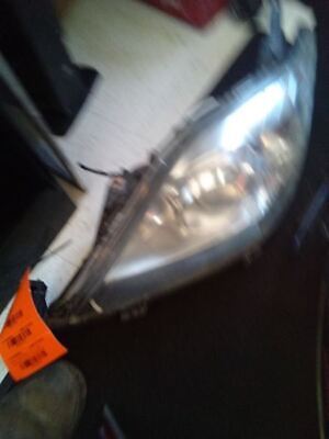 A close up of the headlight on a car