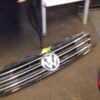 A car grill with the vw logo on it.