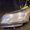 A close up of the headlight on a car