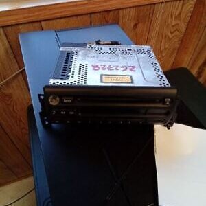 A dvd player sitting on top of a table.