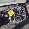 A broken down car engine with the words " no fuel."