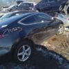 A bunch of cars that are parked in the snow