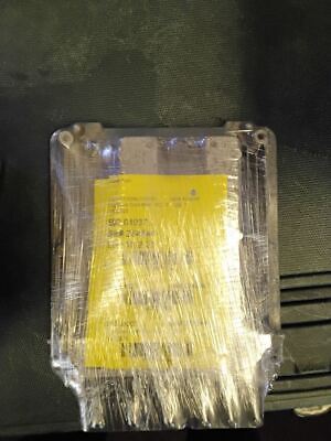 A box of yellow tape is wrapped in plastic.