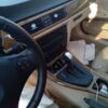 A car with some keys on the dashboard