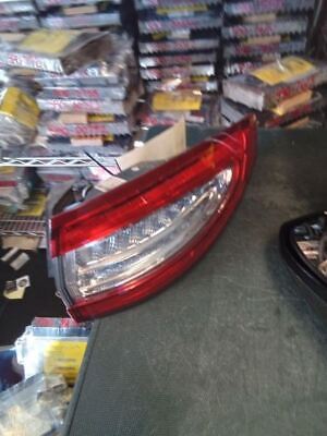 A car that has been smashed in to pieces.