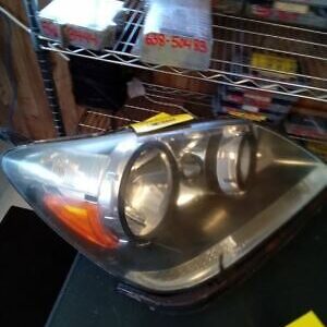 A close up of the headlight on a car