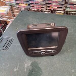 A car stereo sitting on top of a table.