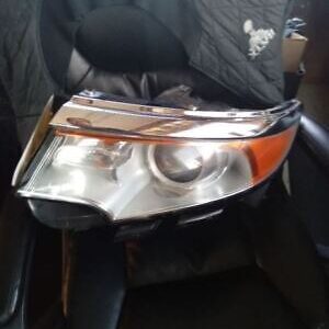 A car headlight with the cover on.