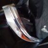 A close up of the handle on a car seat