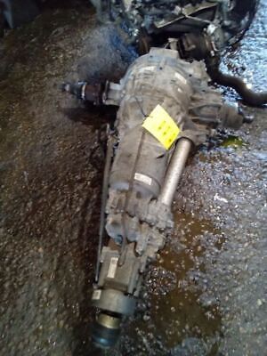 A car that is sitting in the mud.