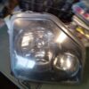 A close up of the head light on a car