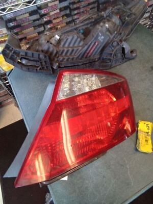 A car 's tail light is shown on the floor.