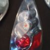 A close up of a bottle with pills inside